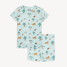 Load image into Gallery viewer, The Central Bark Pajama Short Set by Magnetic Me makes bedtime easy and fun with its playful puppy park design. Crafted from eco-friendly TENCEL™ modal fabric, these pajamas are soft, breathable, and gentle on your child’s skin. The innovative magnetic closure at the neck lets kids dress themselves effortlessly, eliminating the usual over-the-head struggles. Designed for a snug, comfortable fit, this set ensures a cozy night’s sleep while encouraging independence.
