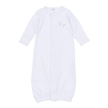 Load image into Gallery viewer, The Magnolia Baby Vintage Stork Converter - White is the most versatile piece for your little one's layette. Crafted from luxurious White Pima Cotton with classic white trim and the signature hand-embroidered stork, this garment uses snap closures to easily transition from a footie to a gown.
