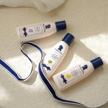 Load image into Gallery viewer, The perfect starter for a baby’s luxurious bath routine, this set includes three gentle formulas to cleanse, soothe, and nourish delicate skin from head to toe.
Set includes:
•    Extra Gentle Shampoo (2 oz) — High-moisture, low-suds formula enriched with provitamin B5 and vitamin E to cleanse hair and scalp while leaving hair soft, shiny, and healthy-looking
•    Soothing Body Wash (2 oz) — A calming, soap-free wash with allantoin, provitamin B5, and vitamin E to gently cleanse while rebalancing skin’s nat
