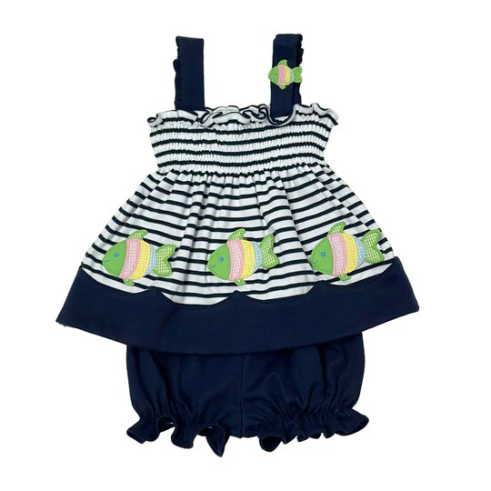 Elevate your little one's wardrobe with the Infant Girl's Donna Fish Bloomer Set from Zuccini Kids. This adorable ensemble combines a navy and white tunic adorned with charming fish appliques and matching navy bloomer shorts. Crafted from soft knit material, this set ensures your baby girl stays comfortable while looking absolutely precious for any summer occasion. Perfect for beach trips, playdates, or family gatherings!