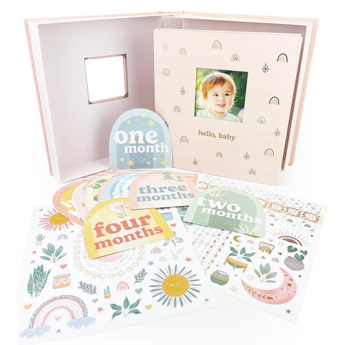 Charming keepsake boxed set for your baby's moments and milestones includes a baby book for photos and journaling, stickers for scrapbooking, 13 monthly photo markers, and storage box for mementos. Personalize the cover with a photo of your baby, and use helpful prompts to write about birthdays, firsts, family, feelings, and more. Monthly entries for the first year, then pages for the years two and three. This Boho, rainbow-themed baby book is perfect for your little girl. A must have for any expecting pare