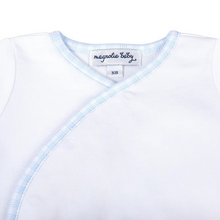 Load image into Gallery viewer, Dress your little one in cozy comfort with the Magnolia Baby New Beginnings Kimono Footed Pant Set in Blue. This adorable set, crafted from luxurious Pima Cotton, features a soft white kimono-style top with delicate blue minicheck trim and ties, paired with matching blue minicheck footed pants. Designed for easy dressing and all-day comfort, it&#39;s perfect for restful moments or gentle play.
