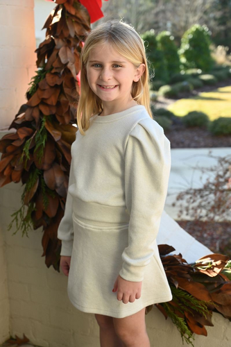 The Peyton Sweater in Snowflake Sparkle is a charming puff-sleeve sweatshirt designed for tweens, featuring a soft glittery thread that adds a subtle shine. Its cozy yet stylish design makes it perfect for pairing with a tiered skirt or the matching Libba Sweater Skirt, creating a dazzling outfit that’s both comfortable and eye-catching.